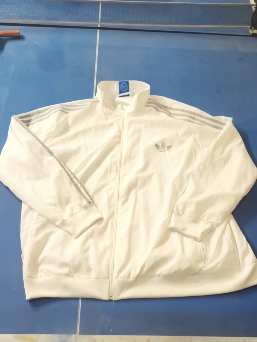 Adidas Men’s 3XL White Windbreaker with Silver Stripes.  Very Cool..